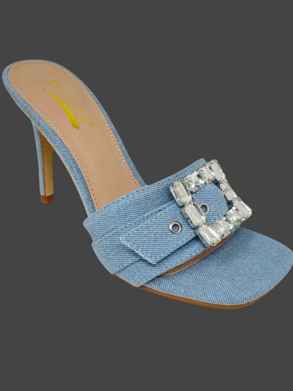 light blue denim stiletto mule with a square toe and a large, crystal-embellish